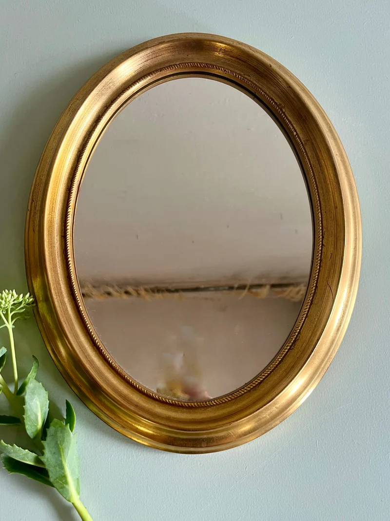 Miroir ovale vintage doré