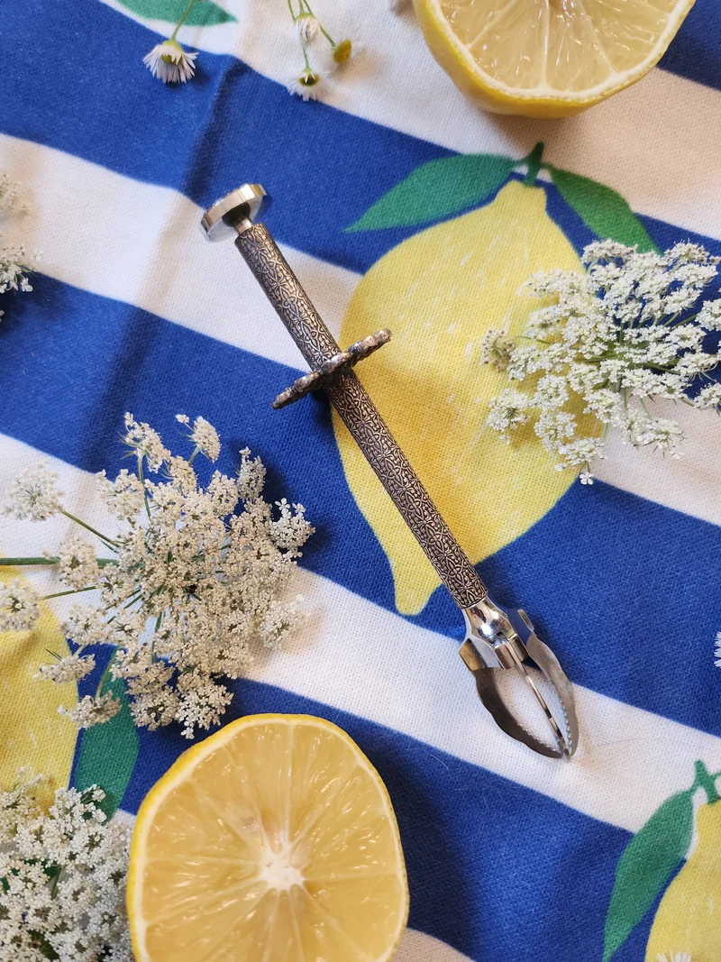 Pince à sucre vintage en métal