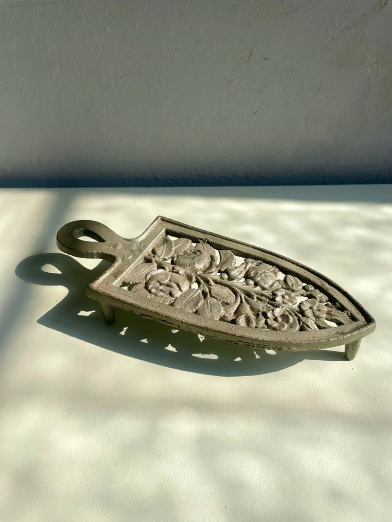 Dessous de plat en fonte