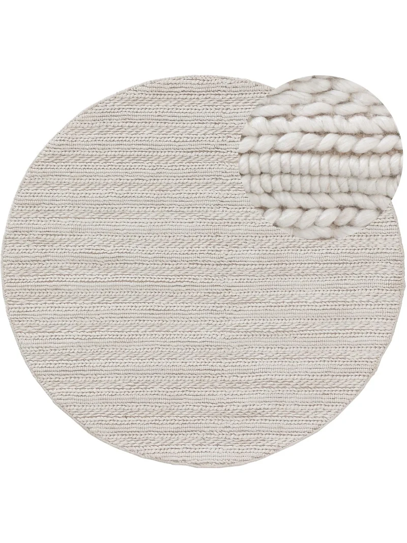 Tapis scandinave tressé rond blanc cassé en laine 100 cm de diamètre