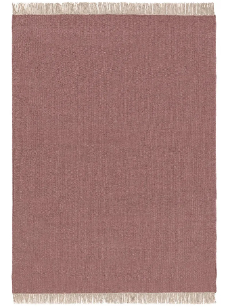 Tapis scandinave uni à franges rose en laine 60x100 cm