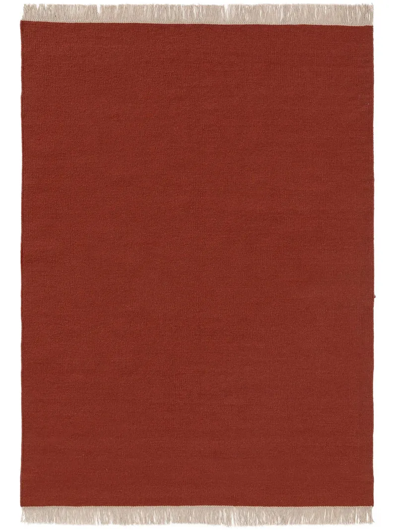 Tapis scandinave uni à franges rouge brique en laine 60x100 cm