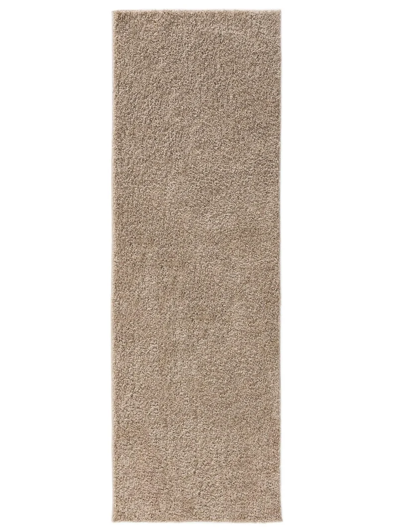 Tapis moderne uni poils longs frisés descente de lit beige lavable 80x250 cm