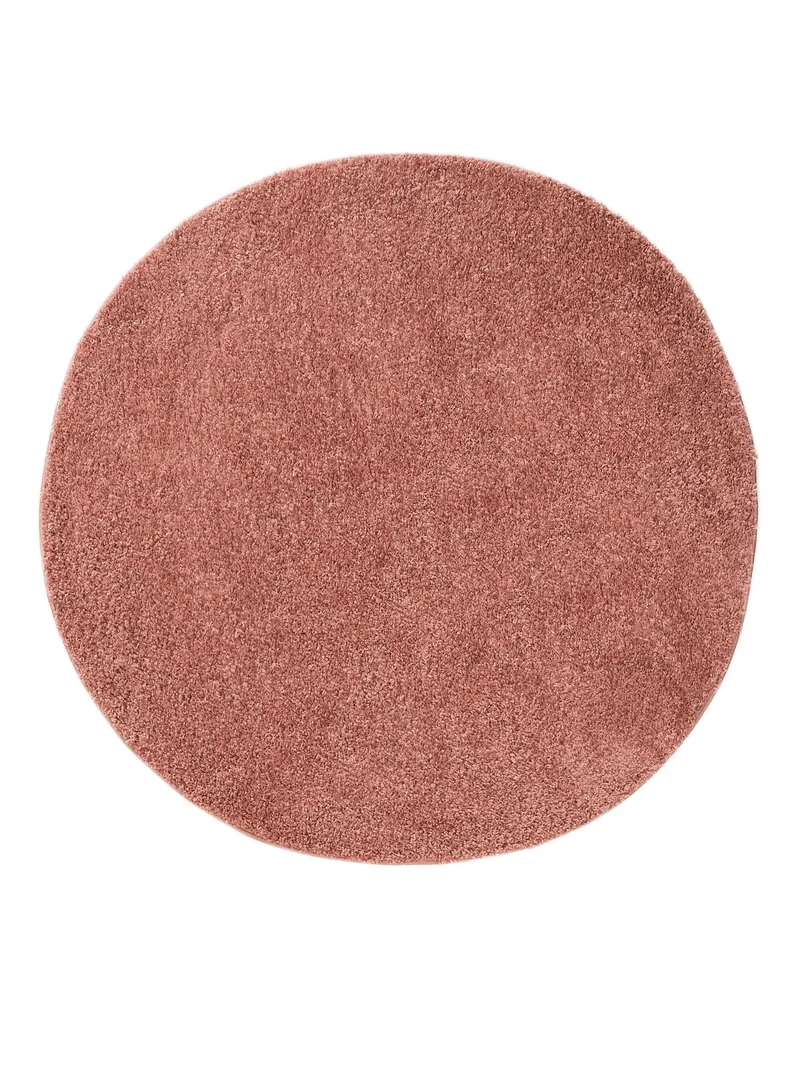 Tapis moderne uni poils longs frisés rond rose lavable 80 cm de diamètre